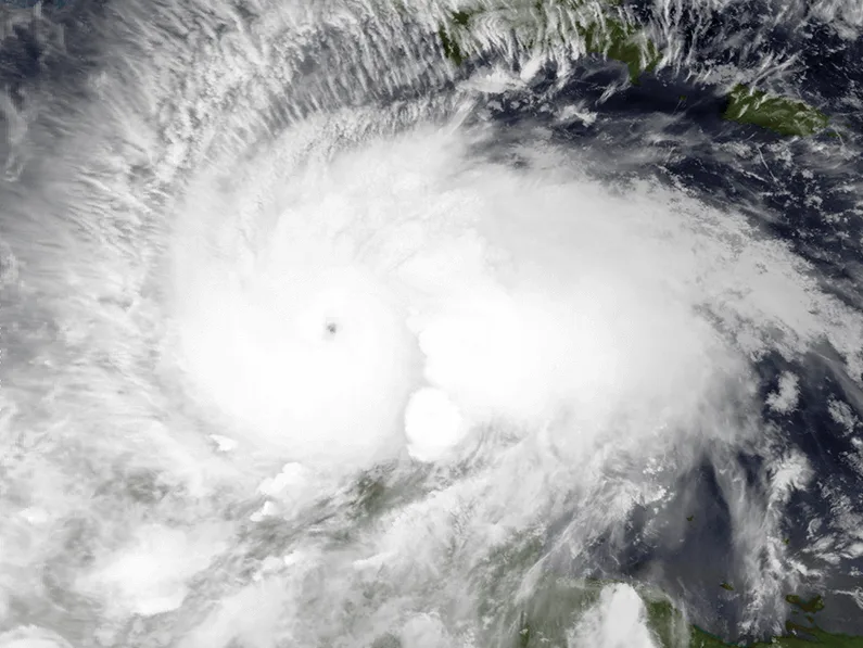 Satellite image of Hurricane Matthew showing a well-defined eye surrounded by dense cloud bands